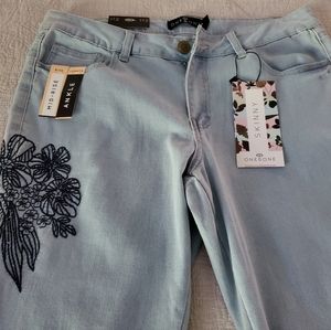 (LOOK AT VIDEO) SIZE 12 (NEW) DENIM CAPRI'S WITH NAVY/BLUE EMBROIDERED DESIGN
